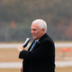 U.S. Vice President Mike Pence removes his face mask as he arrives for a “Defend The Majority” campaign event on December 17, 2020 in Columbus, Georgia.